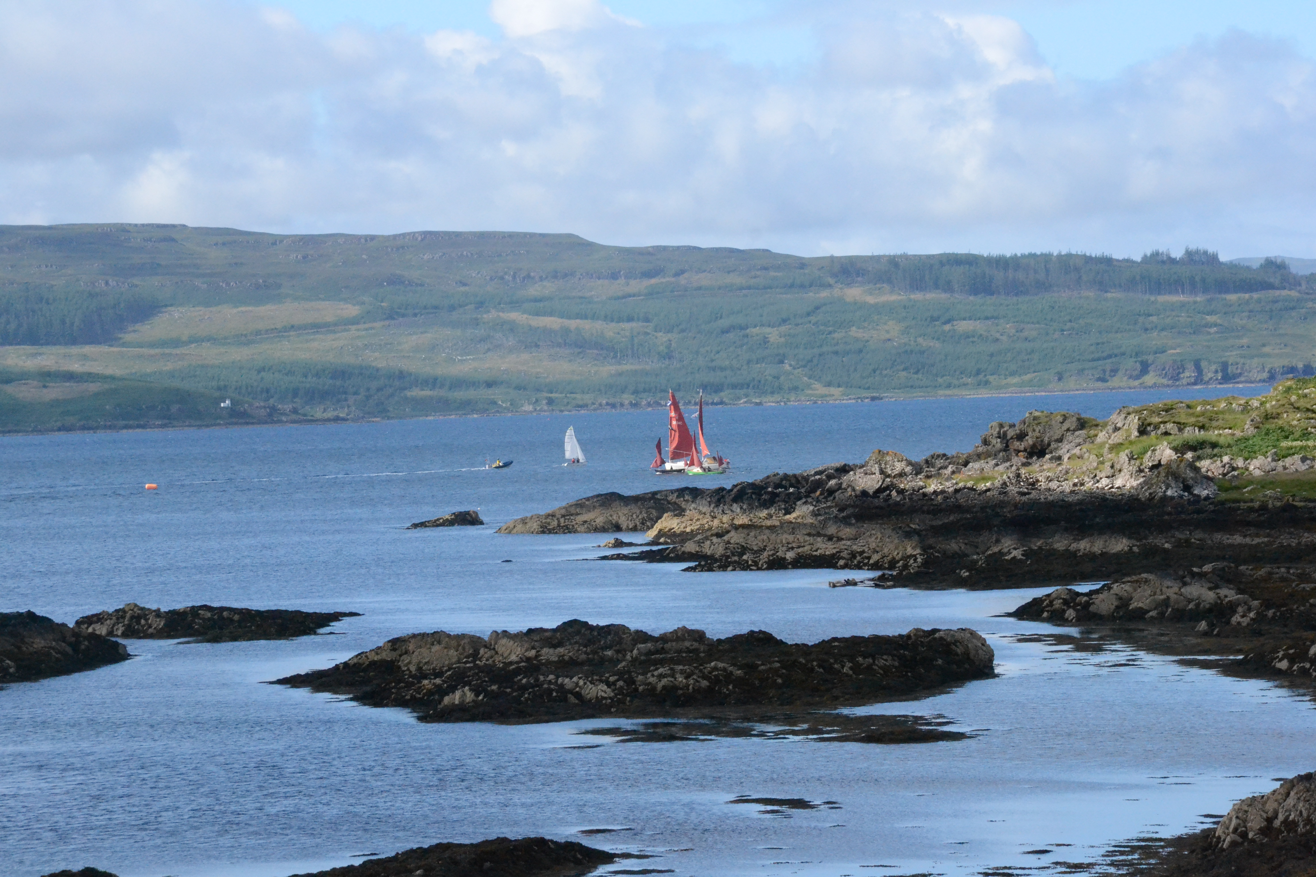 Geoff and Alex round the leeward mark, ahead of the rest of the fleet